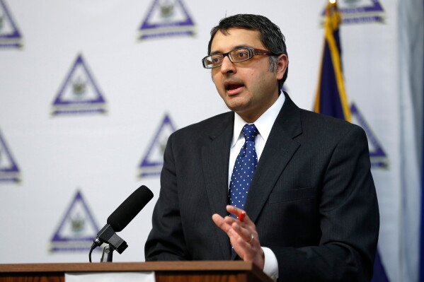 Nirav Shah, director of the Maine Center for Disease Control and Prevention, speaks at a news conference, April 28, 2020, in Augusta, Maine. (AP Photo/Robert F. Bukaty)