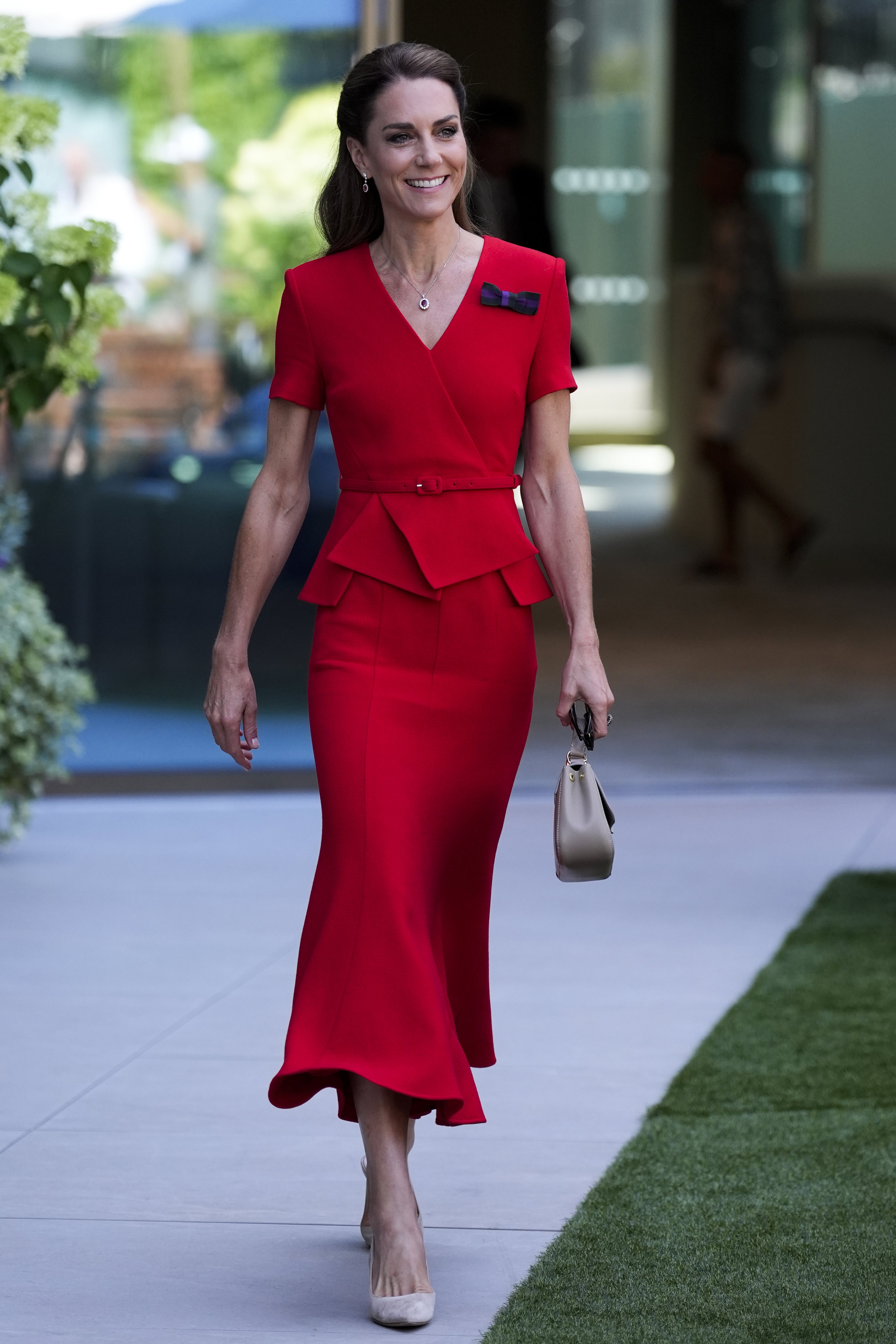 Middleton looked gorgeous in a red peplum gown at the Championships
