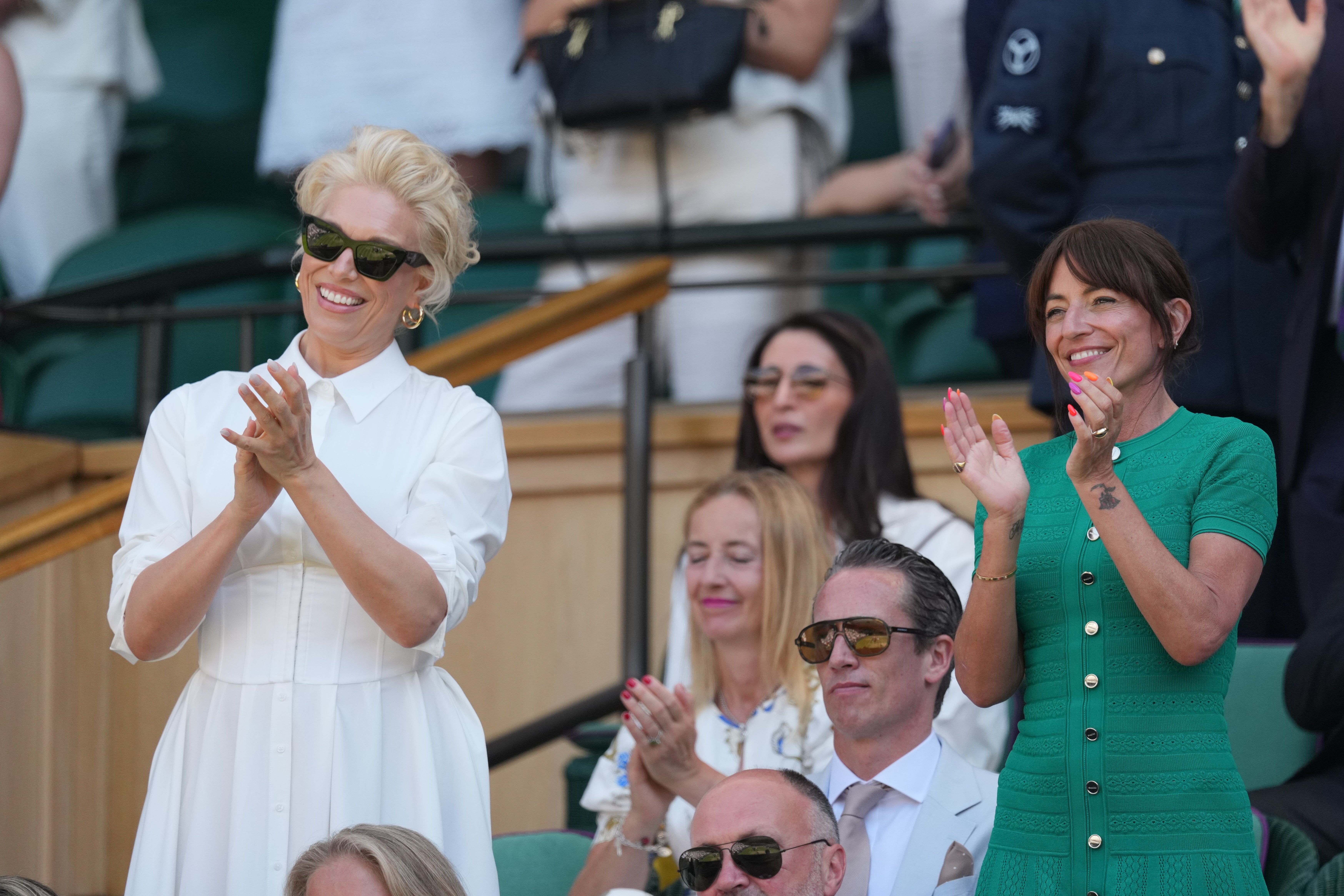 Hannah Waddingham and Davina McCall applauding the winners of the men's doubles final