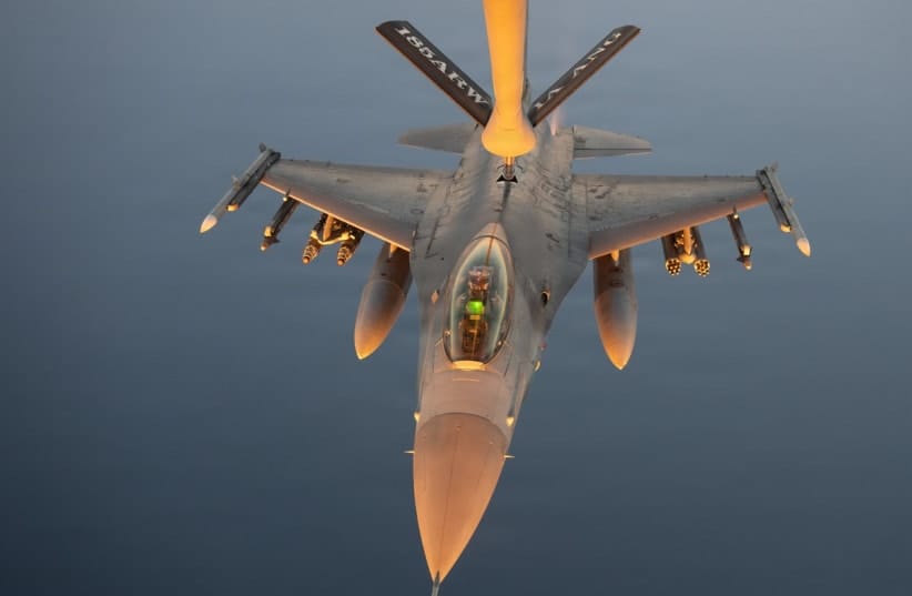 A US Air Force F-16 fighter jet refuels during a patrol over the Middle East, pictured in an image shared by US Central Command on July 12, 2026.