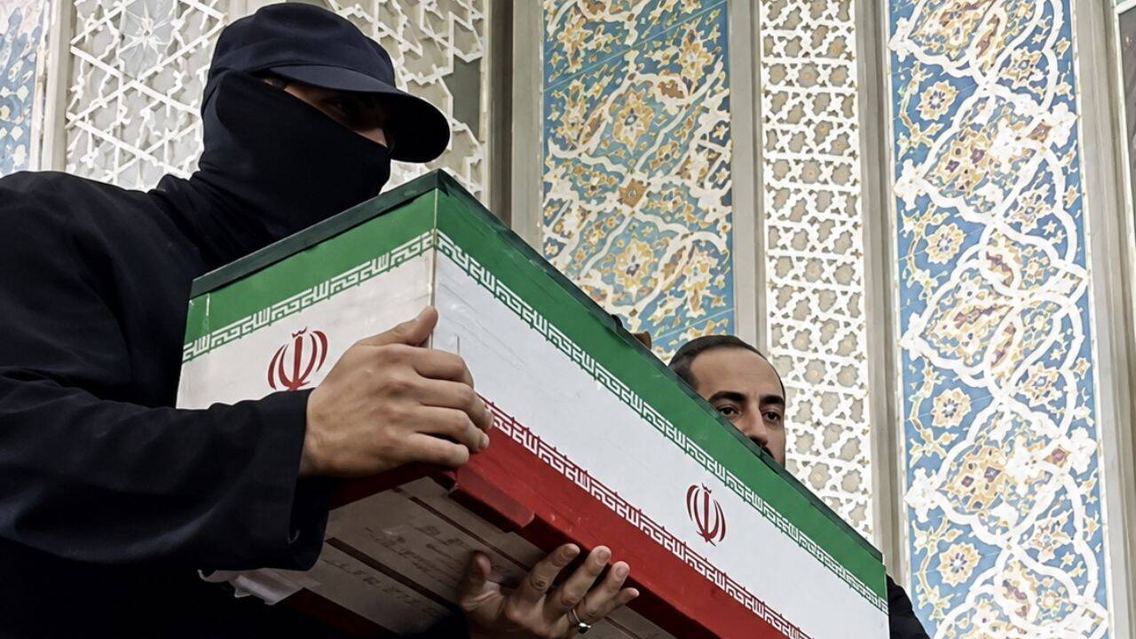 'Who was the masked man?' Khamenei funeral mystery solved