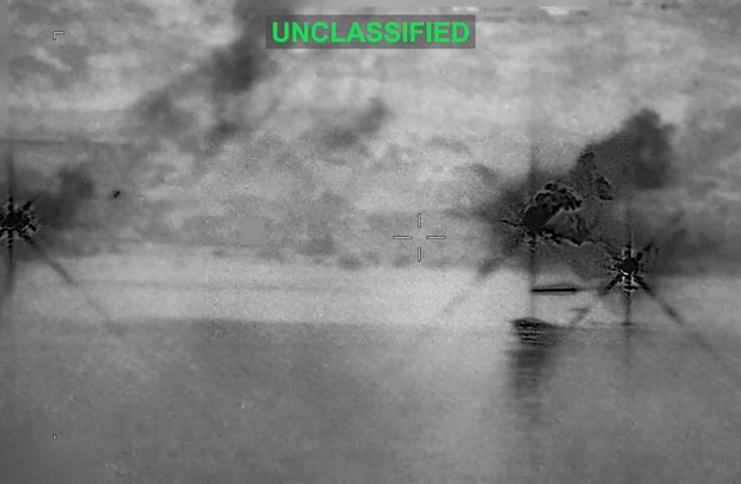 Smoke rises at an unknown location following what US Central Command says is a new wave of strikes against Iran on Tuesday after three tankers were hit by projectiles in the Strait of Hormuz, in this still image taken from video released July 7, 2026.