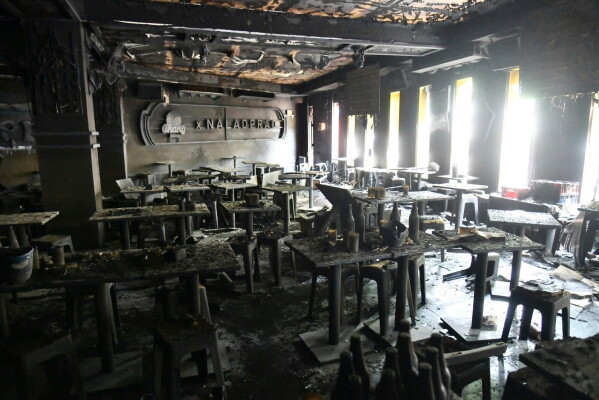 In this handout photo released by Bangkok Metropolitan Administration, the interior of a beer bar is seen after a fire in Bangkok, Thailand, Monday, July 13, 2026. (Bangkok Metropolitan Administration via AP)