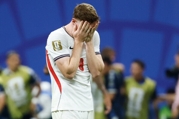 England's Elliot Anderson (8) reacts after Argentina scored a second goal during the World Cup semifinal soccer match between England and Argentina in Atlanta, Wednesday, July 15, 2026. (AP Photo/Erik S. Lesser)