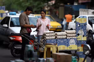 Iran faces region’s harshest mix of wartime contraction and inflation