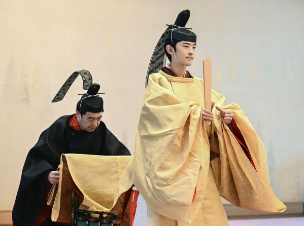 Japan's Prince Hisahito, right, attends his coming-of-age rituals on his 19th birthday at the Imperial Palace in Tokyo, on Sept. 6, 2025. (Japan Pool/Kyodo News via AP, File)