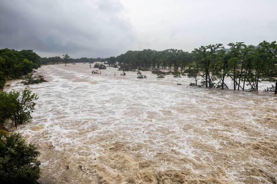 A flooded river is shown.