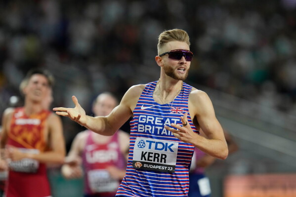 Josh Kerr, of Great Britain, reacts after winning the men's 1500-meters final during the World Athletics Championships in Budapest, Hungary, Wednesday, Aug. 23, 2023. (AP Photo/Ashley Landis, file)
