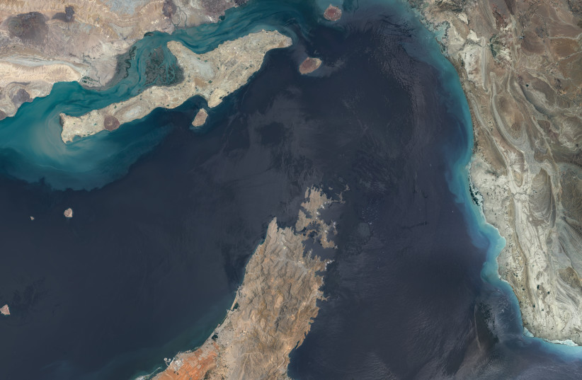 STRAIT OF HORMUZ, OMAN/IRAN -- JUNE 16, 2026: 01 -- Maps4media-processed Sentinel-2 satellite imagery shows a broad overview of the Strait of Hormuz, including the Musandam Peninsula, nearby islands, coastal shallows, and the narrow maritime corridor linking the Persian Gulf with the Gulf of Oman. (credit: Satellite image