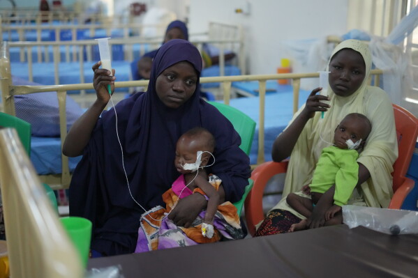 Children suffering from acute malnutrition receive treatment via nasal feeding tubes at a hospital in Sokoto, northwestern Nigeria, Thursday, July 16, 2026. (AP Photo/Sunday Alamba)