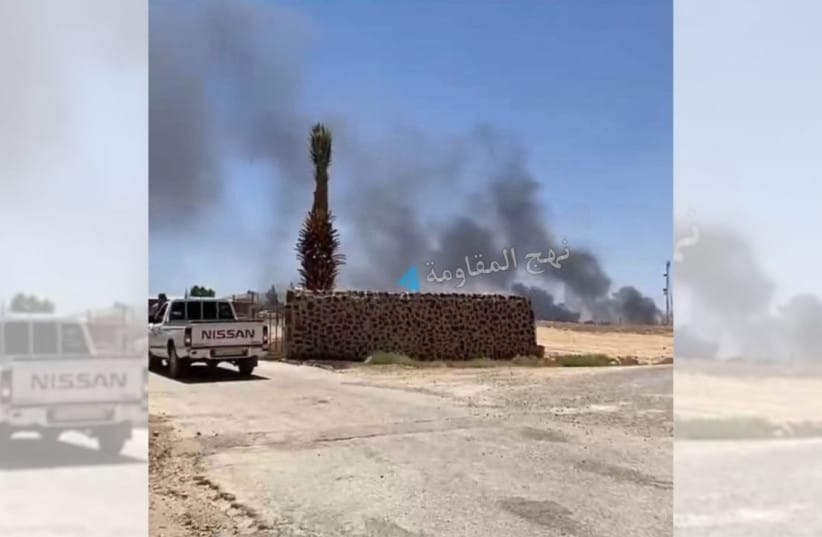 Thick black smoke is seen rising from King Hussein International Airport in Aqaba, Jordan, after it was hit by Iranian ballistic missiles on July 19, 2026..