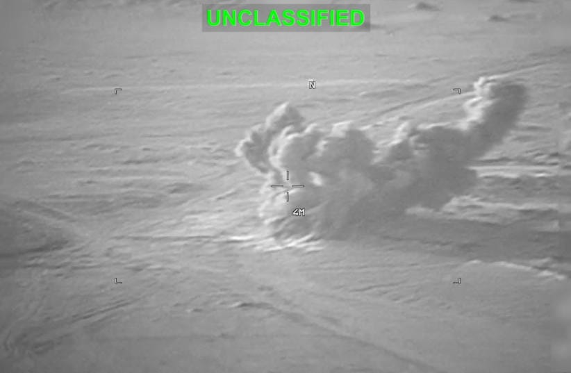 Smoke rises from an explosion at an unknown location, during what US Central Command (CENTCOM) says are strikes on Iran, in this still image taken from a handout video released on July 19, 2026.