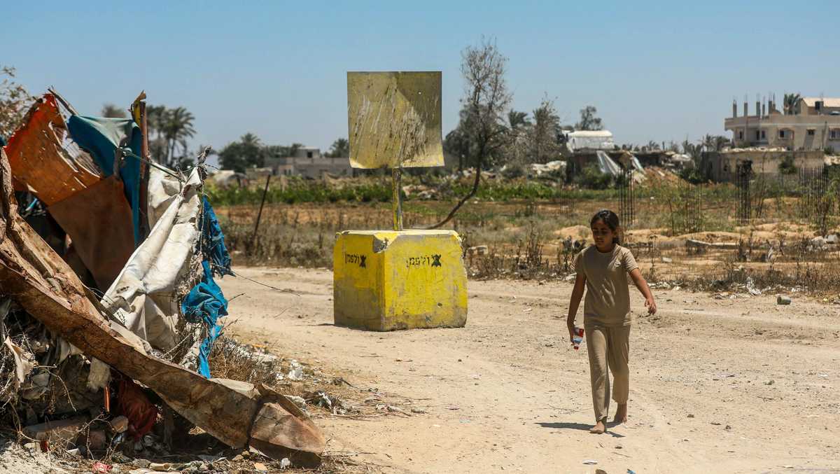 Israel is building a miles-long earthen barrier dividing Gaza