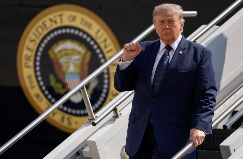 US President Donald Trump gestures as he disembarks the new Qatari-gifted Air Force One, while he arrives at John F. Kennedy International Airport in New York City, US, July 17, 2026.