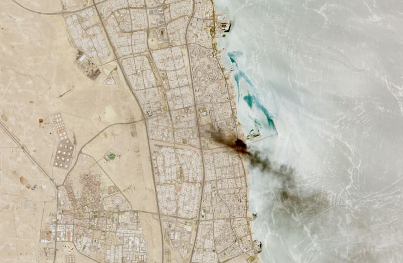 A satellite image shows smoke billowing near an oil facility in Ahmadi Governorate, Kuwait, July 18, 2026.