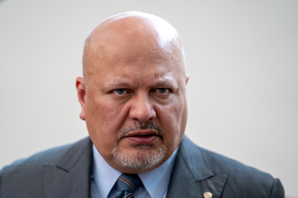 Karim Khan, Prosecutor of the International Criminal Court, looks up prior to a press conference in The Hague, Netherlands, July 3, 2023. (AP Photo/Peter Dejong, File)