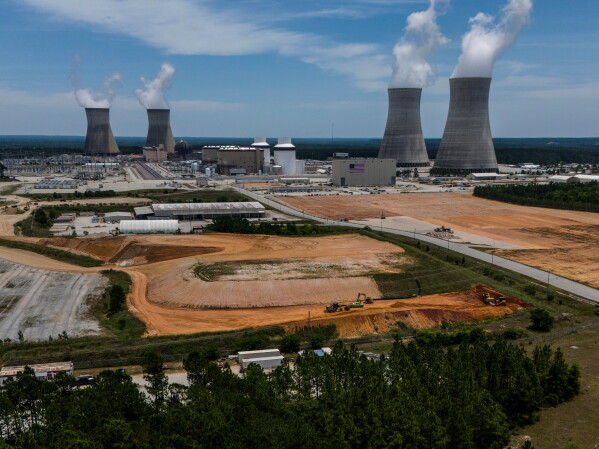 The four nuclear reactors and cooling towers operate at the Alvin W. Vogtle Electric Generating Plant, May 31, 2024, in Waynesboro, Ga. (AP Photo/Mike Stewart, File)