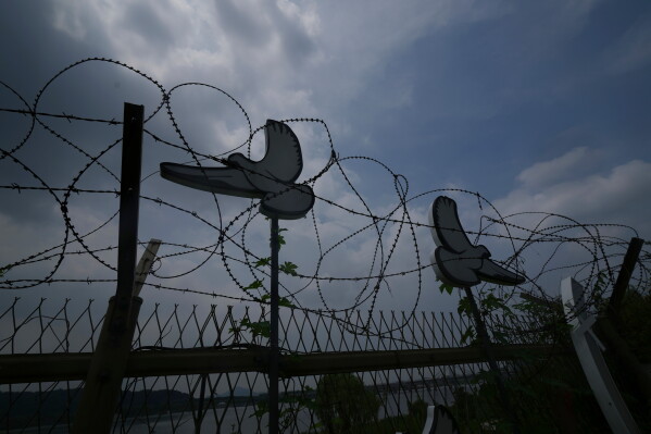 A symbolic structure remains to commemorate the removal of the military barbed-wire fence in Goyang, South Korea, Friday, July 3, 2026. (AP Photo/Lee Jin-man)