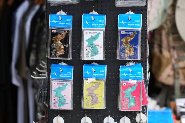 Magnets showing the Korean peninsular are displayed outside a souvenir shop in Paju, South Korea, Saturday, July 4, 2026. (AP Photo/Lee Jin-man)