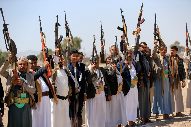 Armed Yemenis brandish their weapons as they rally in solidarity with Lebanon and Iran on the outskirts of the Houthi-controlled capital, Sanaa, on July 2, 2026 [AFP]