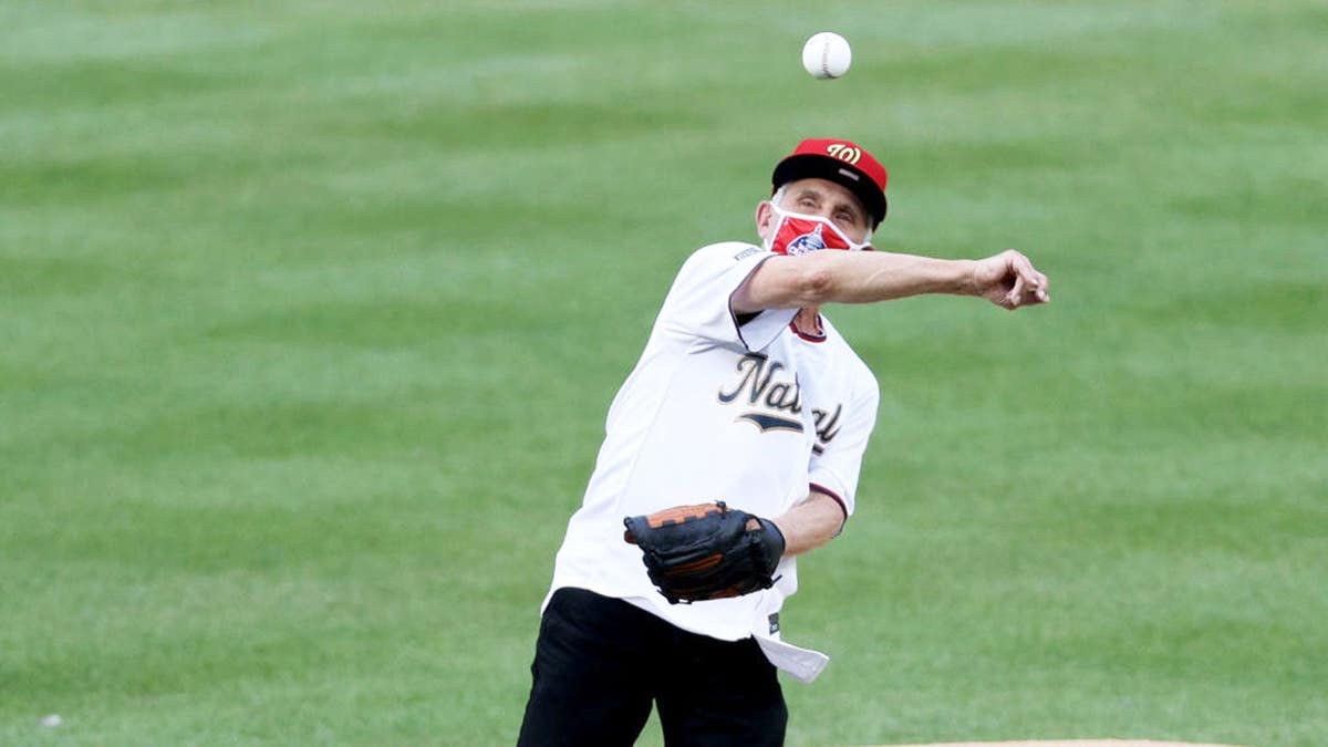 Dr. Anthony Fauci throws out the ceremonial first pitch at Nationals Park.