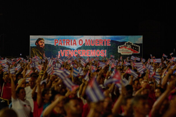 A billboard depicting the late leader Fidel Castro and reading "Homeland or death, we will defeat!" is seen during an event marking the 73th anniversary of the start of the Cuban Revolution in Pinar del Rio, Cuba, Sunday, July 26, 2026. (AP Photo/Ramon Espinosa)