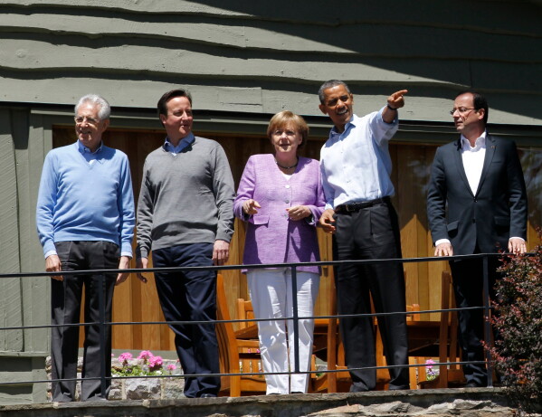 From left, Italian Prime Minister Mario Monti, British Prime Minister David Cameron and German Chancellor Angela Merkel and French President Francois Hollande, right, listen as President Barack Obama shows off the grounds at the G-8 Summit Saturday, May 19, 2012 at Camp David, Md. (AP Photo/Charles Dharapak, File)