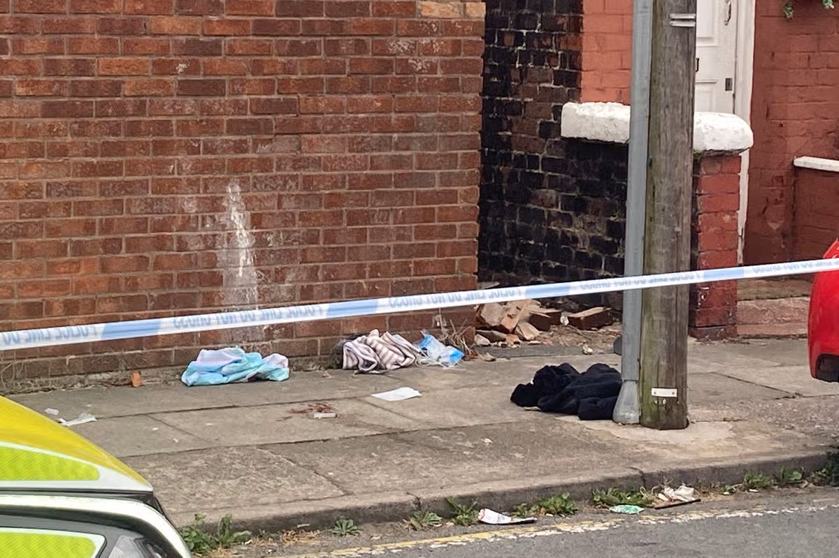 Blood and medical equipment inside police cordon on Olney Street after stabbing