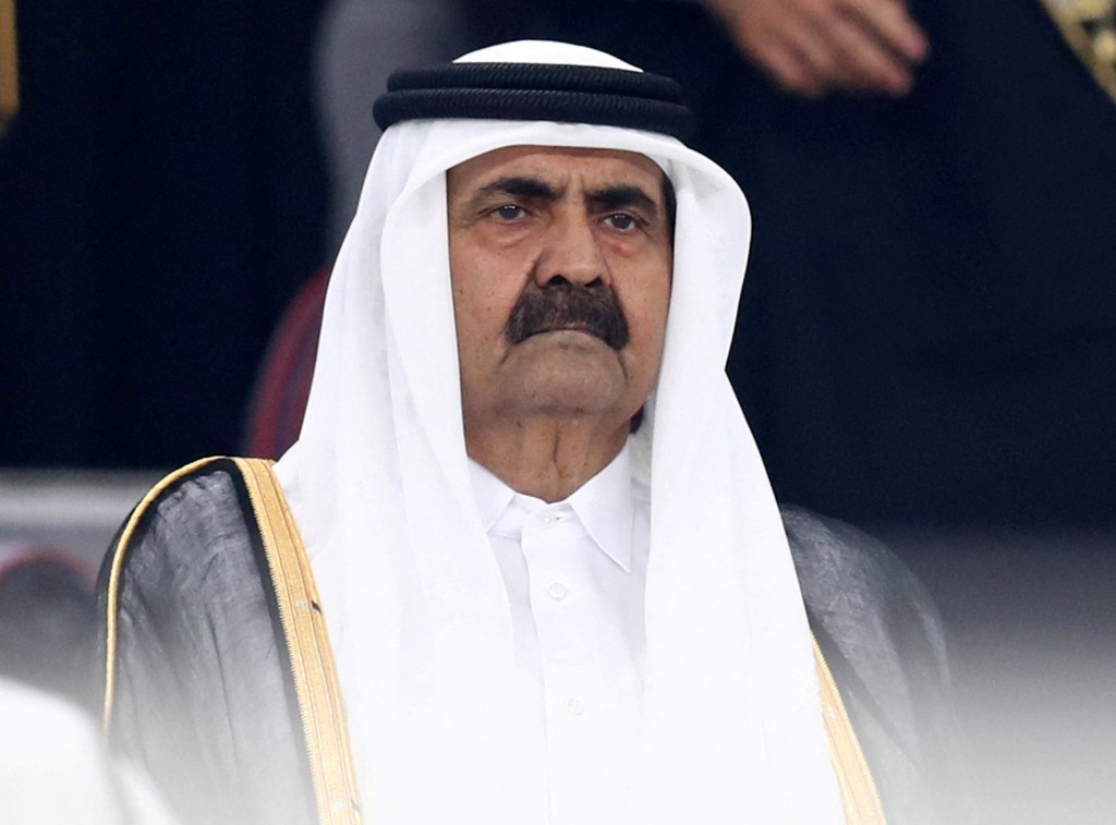 Sheikh Hamad bin Khalifa al-Thani in a white thobe and black agal.