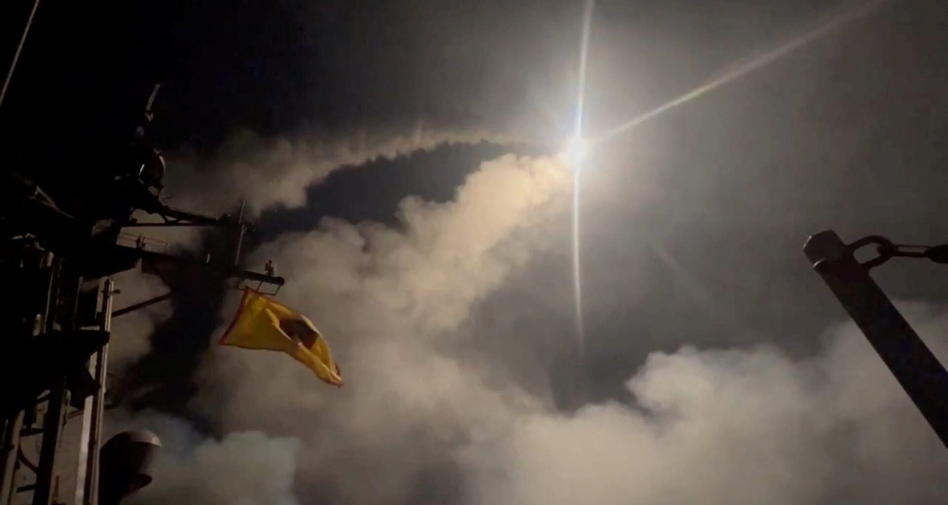 Missiles are fired into the sky, said to be, for an operation against the Yemen's Houthis at an unidentified location in this screengrab