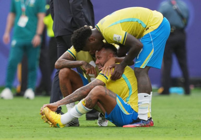 Soccer Football - FIFA World Cup 2026 - Round of 16 - Brazil v Norway - New York New Jersey Stadium, East Rutherford, New Jersey, U.S. - July 5, 2026 Brazil's Neymar, Raphinha and Vinicius Junior look dejected after the match as Brazil are eliminated from the World Cup IMAGN IMAGES via Reuters/James Lang