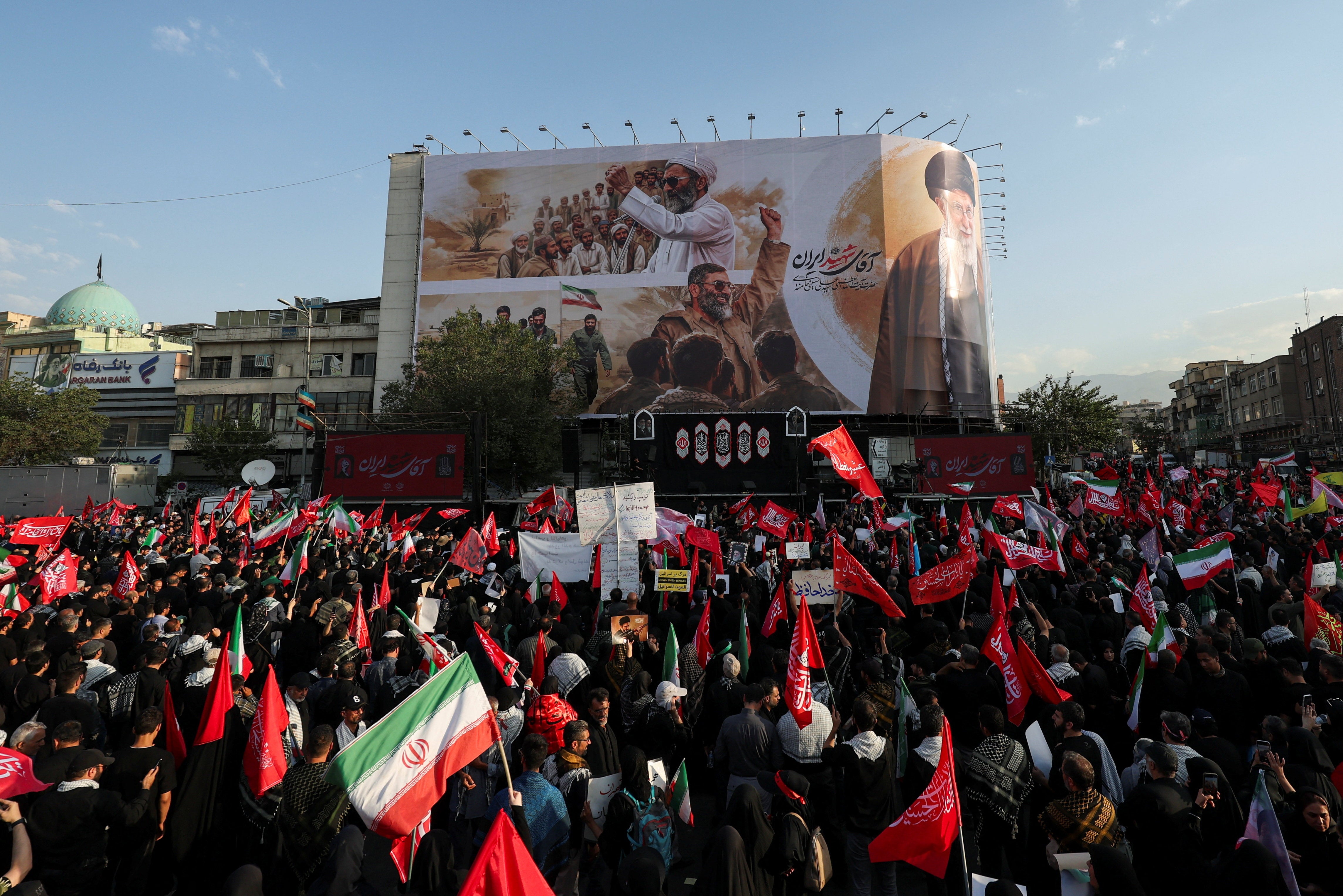 Mourners gather on the day of a funeral procession for Iran's late Supreme Leader Ayatollah Ali Khamenei