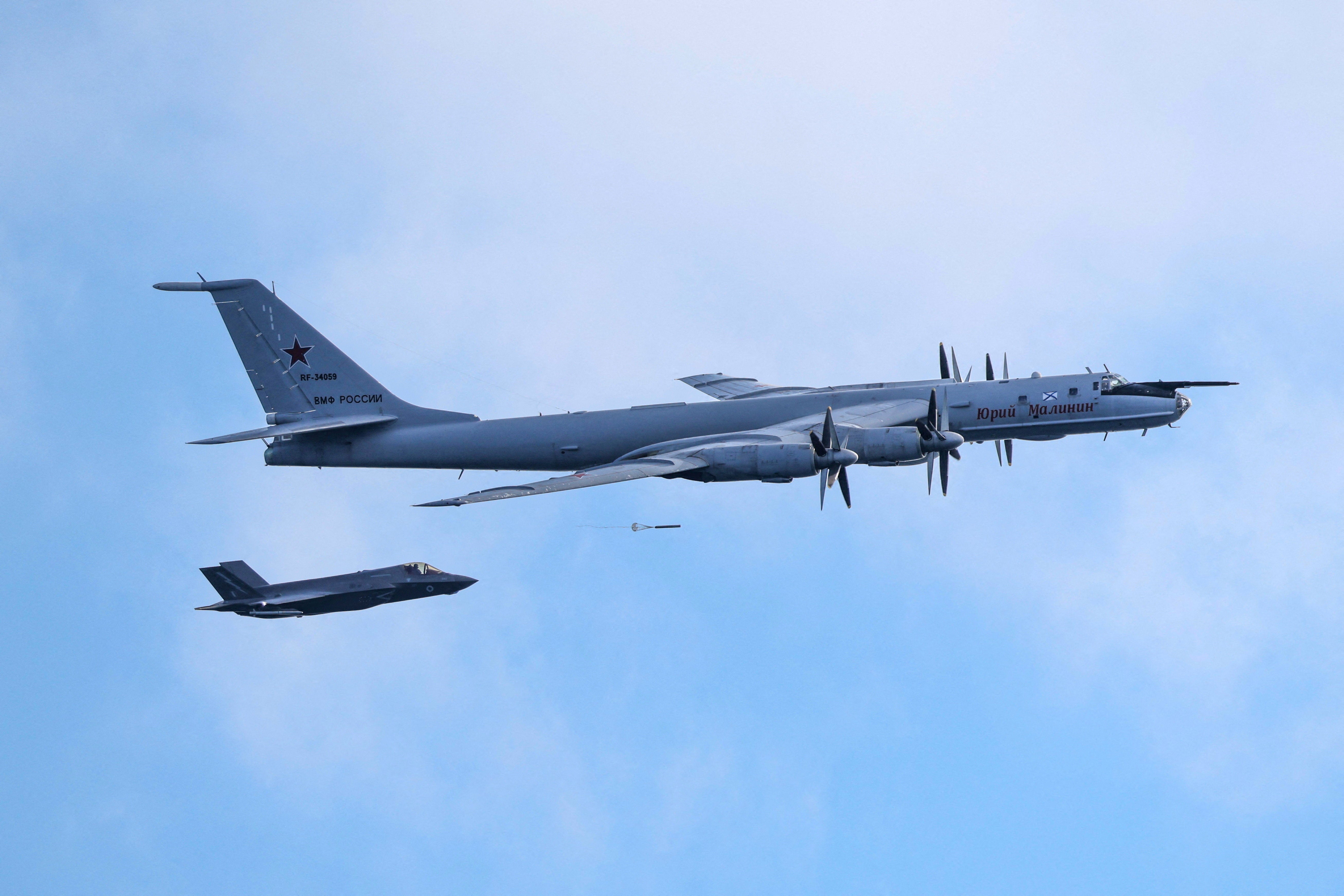 The Bear-F, a plane which can be used for reconnaissance or as a bomber, is believed to have dropped tens of sonobuoys into the waters near the Prince of Wales