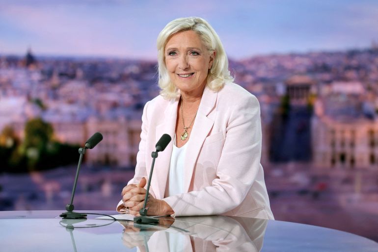 French far-right leader Marine Le Pen, member of parliament for the Rassemblement National (National Rally - RN) party, poses prior to an interview on the evening news broadcast of French TV channel TF1, following the verdict in her appeal trial over misuse of EU funds, in Boulogne-Billancourt, near Paris, France, July 7, 2026. REUTERS/Christian Hartmann/Pool TPX IMAGES OF THE DAY