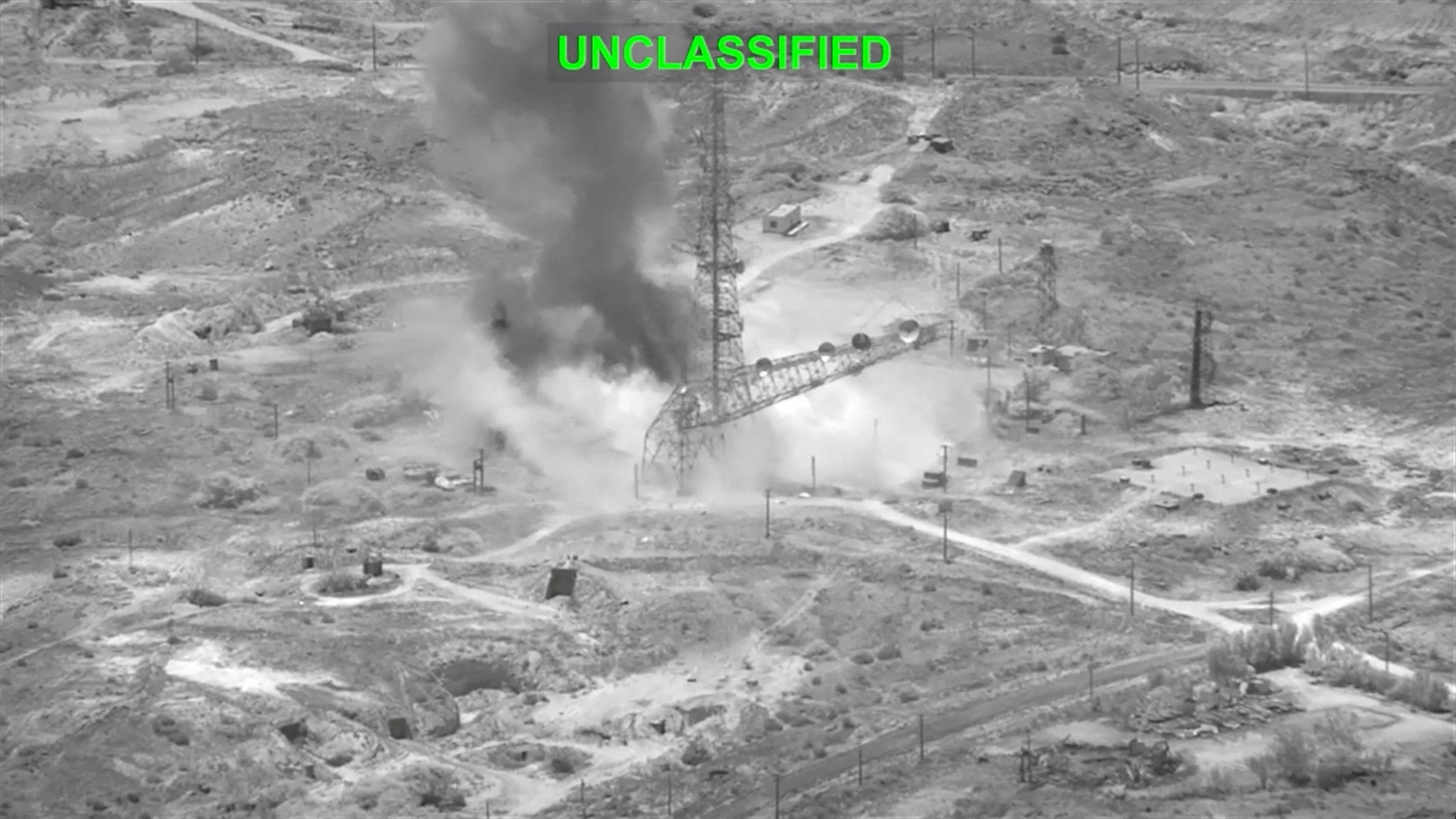 Smoke rises from an explosion at an unknown location, during what U.S. Central Command (CENTCOM) says are strikes on Iran