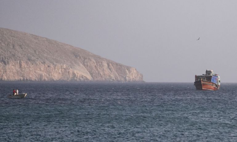 A vessel in the Strait of Hormuz, as seen from Musandam, Oman, July 16, 2026 [Reuters]