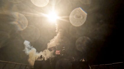 A U.S. warship launches a munition at an unknown location during what the U.S. military says is its latest wave of strikes on Iran, hitting Iranian military targets such as coastal surveillance and air defense sites, military logistics infrastructure, and maritime capabilities, in this still image taken from handout video released July 16, 2026.