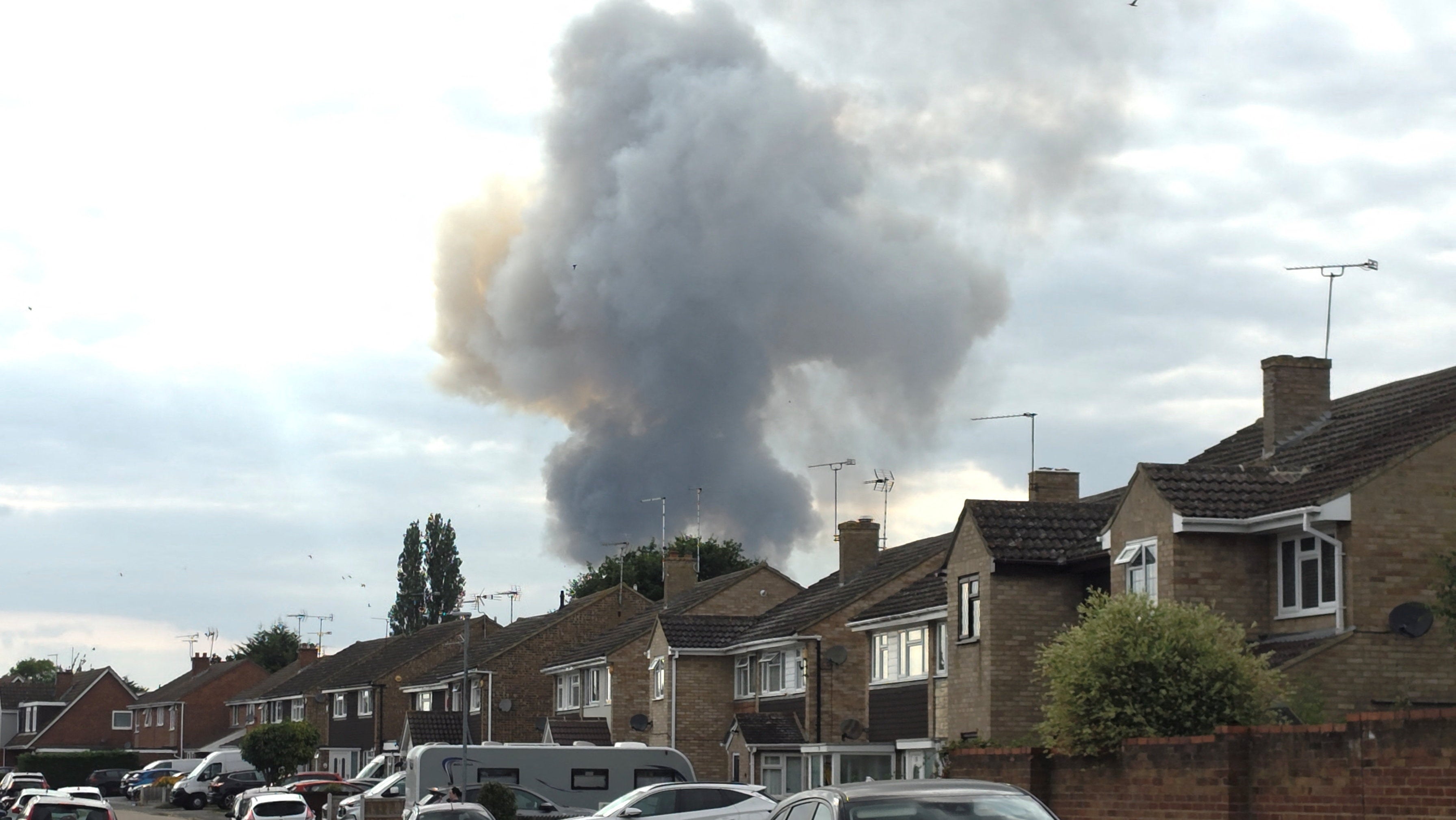 Smoke billows from a fire at an Essex industrial unit