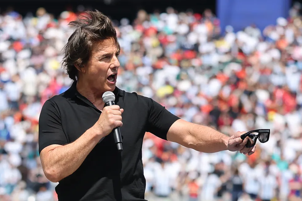 Tom Cruise delivers a speech before the World Cup final