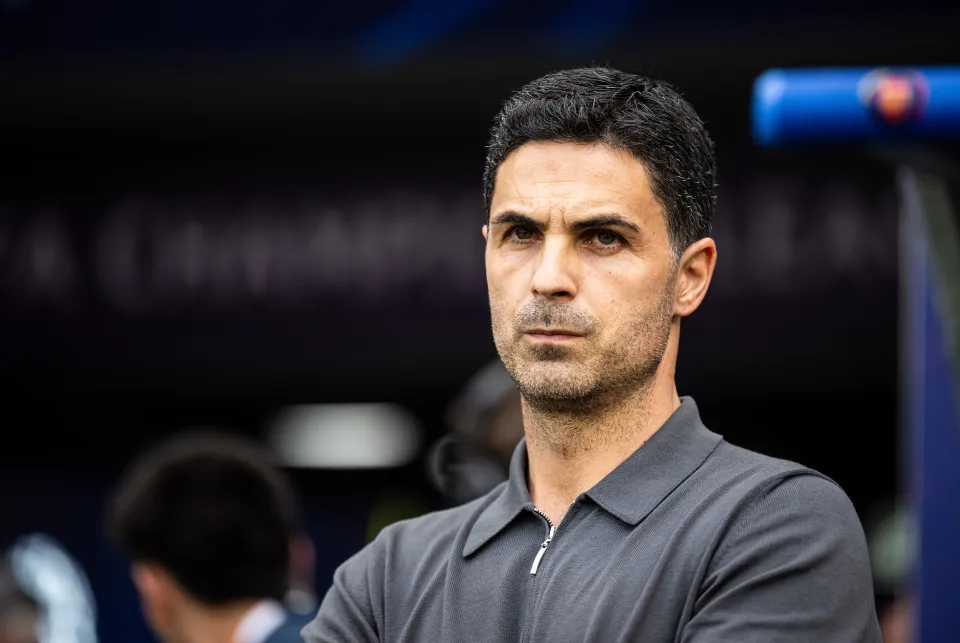 Arsenal manager Mikel Arteta, wearing a dark grey polo shirt, looks on during the Champions League final against PSG, May 2026.