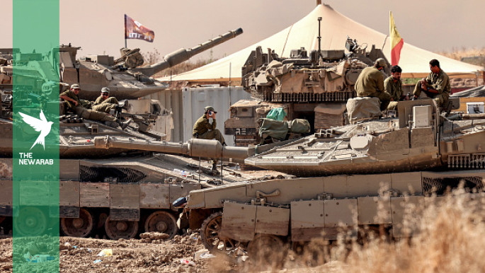 Israel is building a miles-long earthen barrier inside Gaza