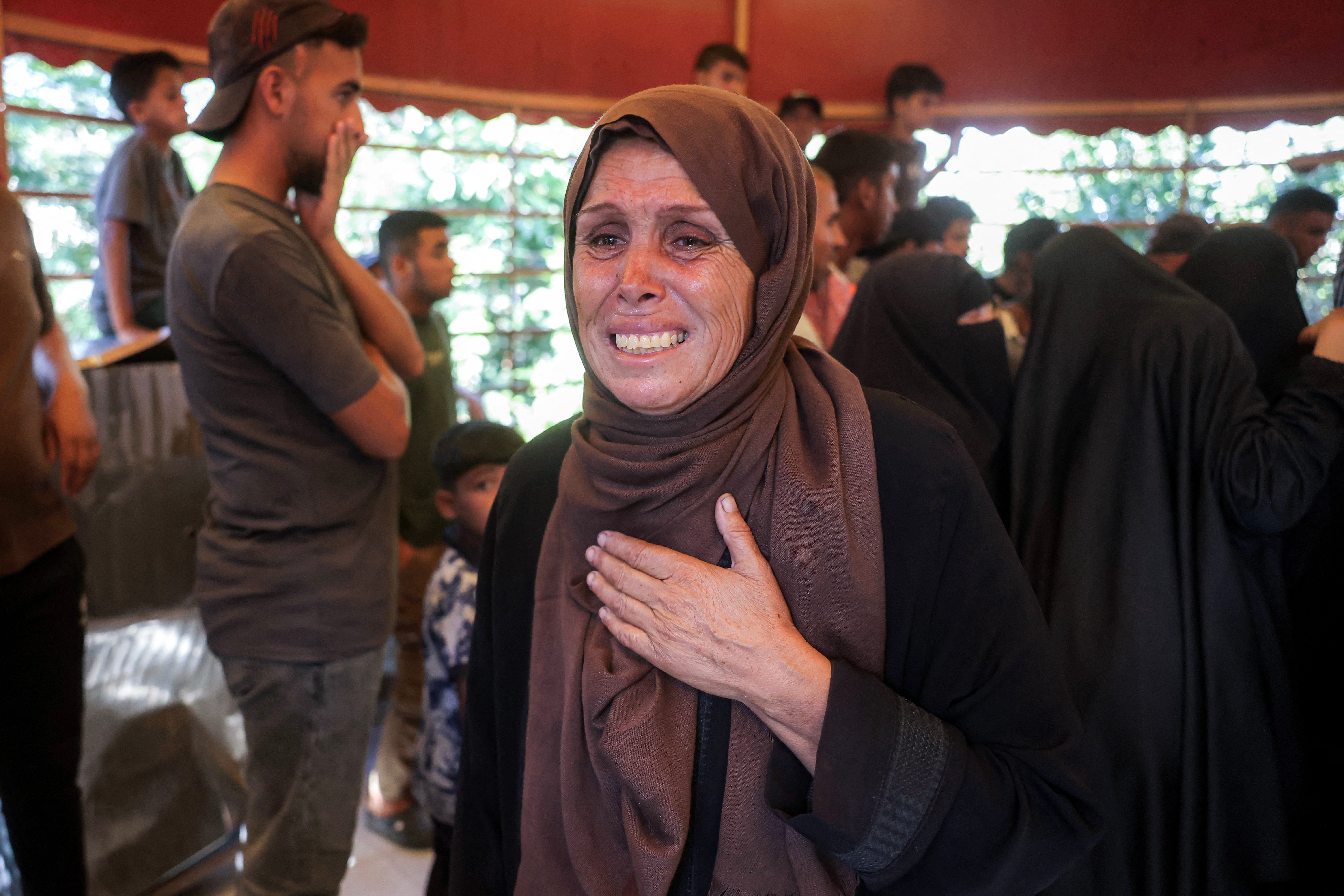 A mourner reacts during the funeral of a victim who was killed in a reported Israeli strike on a tent according to medics, at Nasser Medical Complex in Khan Yunis in the southern Gaza Strip on July 8, 2026