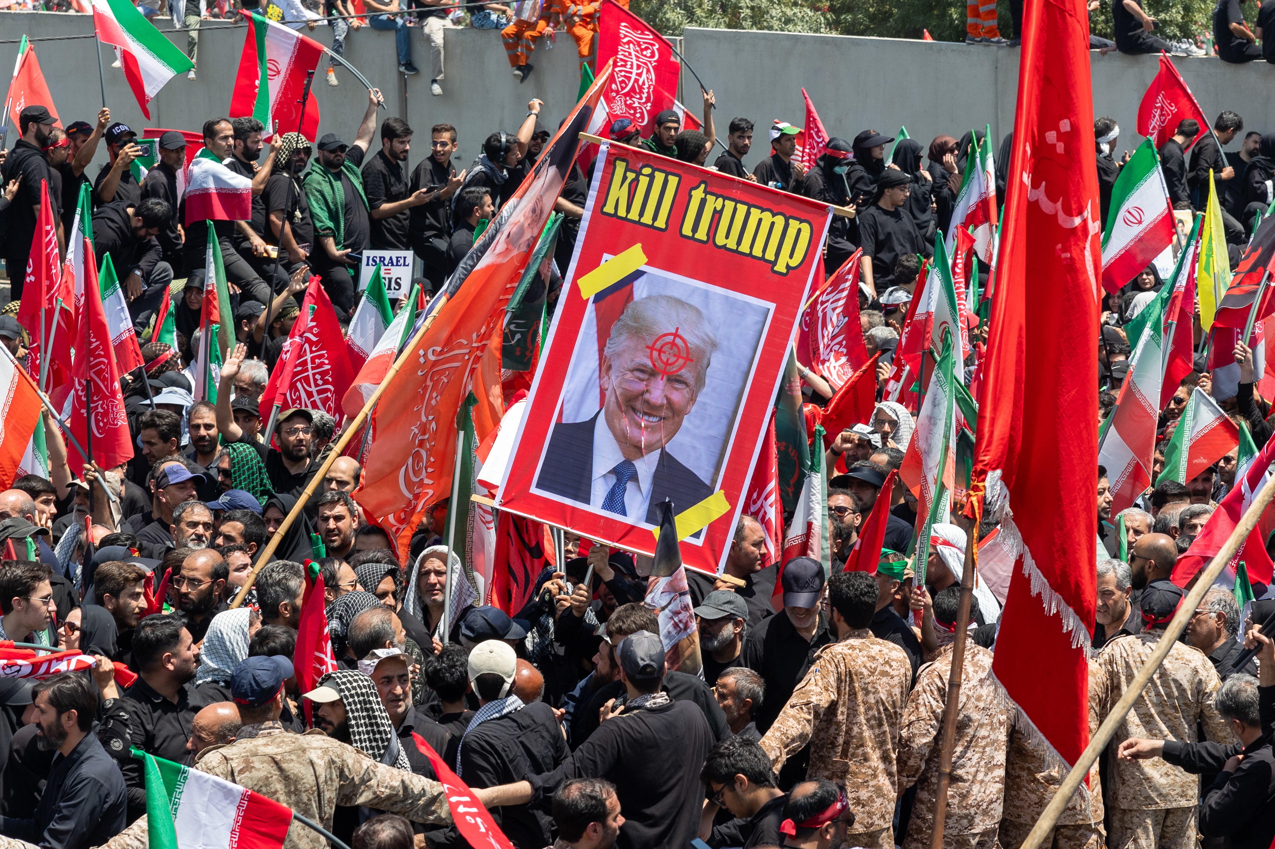 Trump spent the NATO summit in Turkey saying he remains at ‘No. 1’ on Iran’s kill list as protesters and mourners threatened to retaliate for the US war