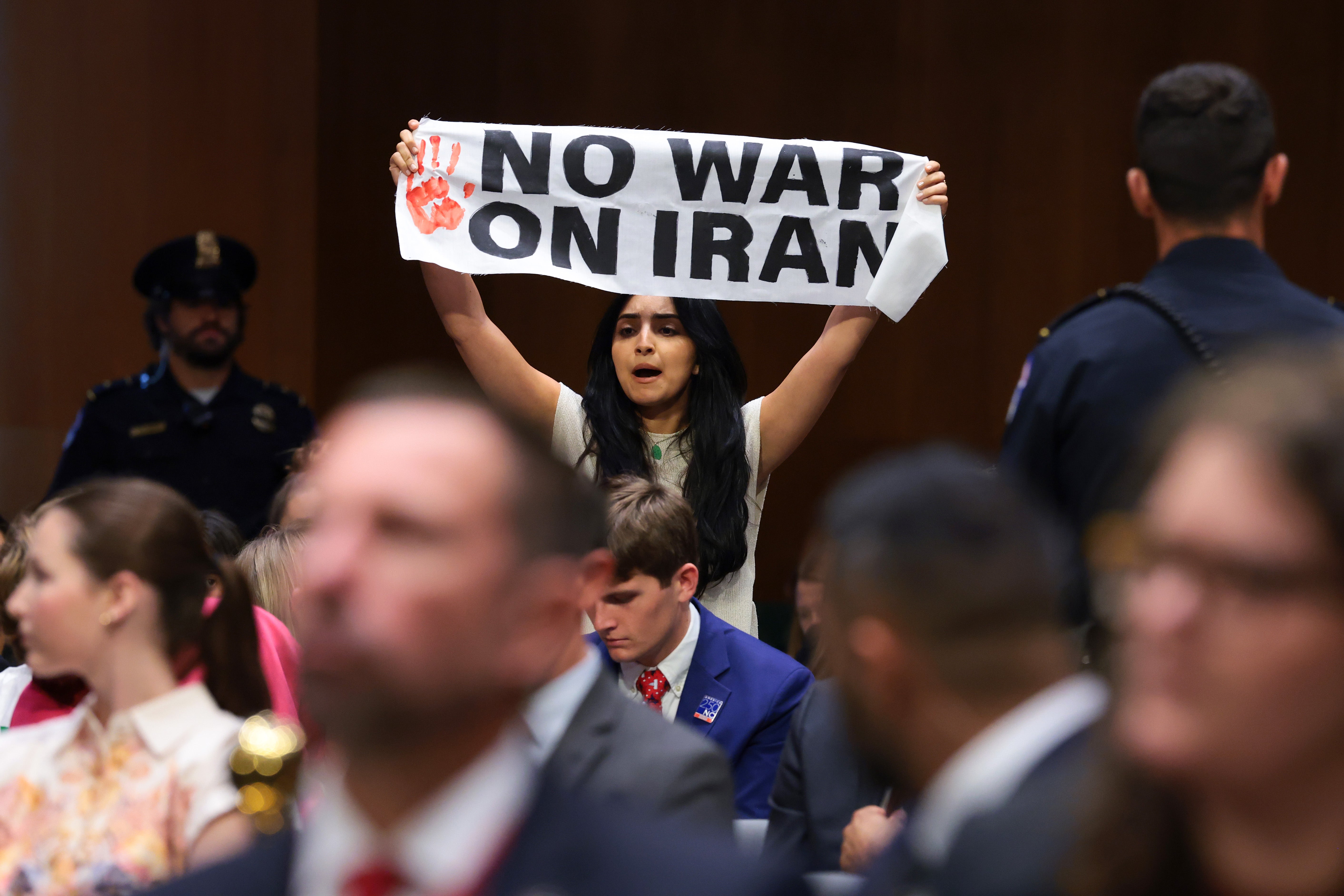 Several protesters immediately interrupted Hegseth’s opening remarks as he urged senators to approve a ‘necessary injunction’ of cash that is set to expand the Pentagon’s budget to $1.5 trillion
