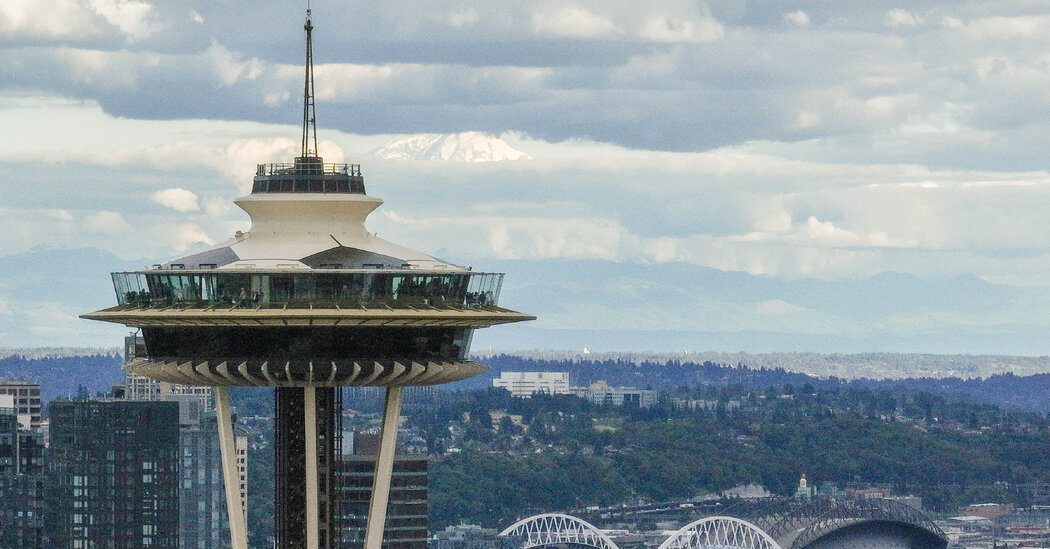 Seattle Police Search for 2 Men Who Parachuted From the Space Needle