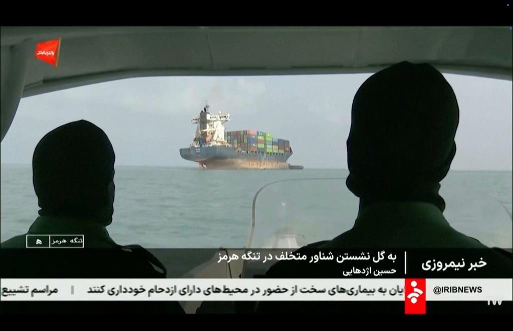 A frame grab of footage aired on Wednesday by Iranian state television shows a vessel that ran aground in the Strait of Hormuz. Photo: Iranian state television via AP