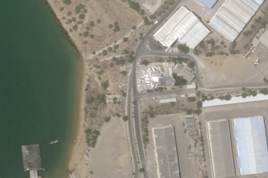 A satellite image shows damage at the control tower in the port of Chabahar