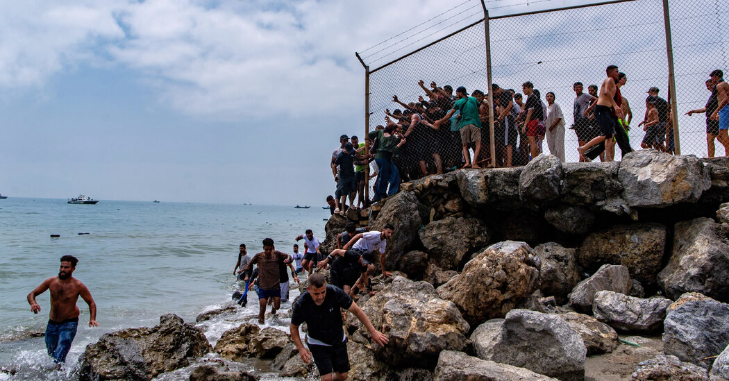 Thousands of Migrants Enter Ceuta, a Spanish Enclave, From Morocco