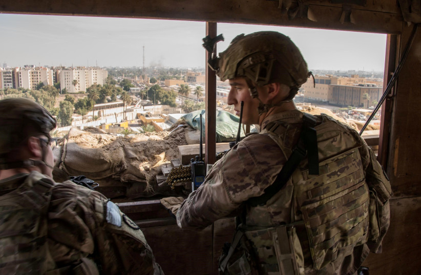US Army soldiers keep watch on the US embassy compound in Baghdad, Iraq January 1, 2020