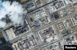 A satellite image taken after the attack shows damage at the Omsk oil refinery